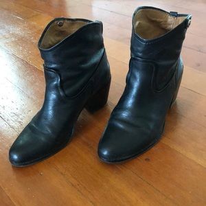 Black leather Frye boots.